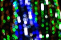 Background of green, blue and orange glitter lights. Defocused Royalty Free Stock Photo