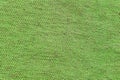 Background of green coarse fabric with pile and thread, closeup texture Royalty Free Stock Photo