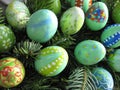 Background with Green Easter Eggs Decorated by Children