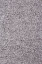 Background of grey knitted fabric. Home made stitchwork. Royalty Free Stock Photo