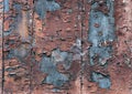 Wooden wall with flaking paint