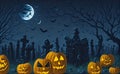 Background for Halloween. cemetery with pumpkins on a spooky full moon night