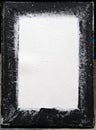 A background of handmade homemade papermaking frame with paper