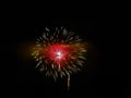 White fireworks display in a color haze of green and red Royalty Free Stock Photo