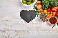 Background healthy food for heart. Healthy food, diet and life. Fresh fruits and vegetables, berries and nuts. Healthy heart conce Royalty Free Stock Photo