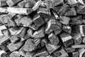 Background of heap firewood stack from natural wood