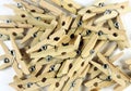 background of heap of wooden clothespins, selective focus .