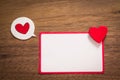 Background with heart on brown wooden floor, blank space for greeting message. Use in Valentine`s Day background concept Royalty Free Stock Photo