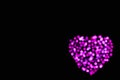 Background with heart made of defocused pink lights with copy space Royalty Free Stock Photo