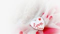 Valentines Day Postcard Design. Delicious heart shaped cookie on a beautiful fabric background and white Vignette Royalty Free Stock Photo