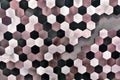 Background of hexagonal metal tiles of different colors