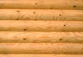 Background of horizontal hewed painted wooden logs Royalty Free Stock Photo