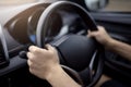 Background of human hand is holding car steering