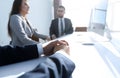 Background image .business woman conducting a meeting