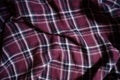 Plaid fabric background closeup laying flat