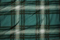 Plaid fabric background closeup laying flat