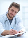 Background image of a doctor writing out a prescription Royalty Free Stock Photo