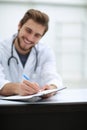 Background image of a doctor writing out a prescription Royalty Free Stock Photo