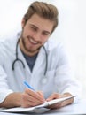 Background image of a doctor writing out a prescription Royalty Free Stock Photo
