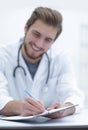 Background image of a doctor writing out a prescription Royalty Free Stock Photo