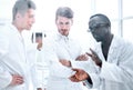 background image is a group of scientists microbiologists. Royalty Free Stock Photo