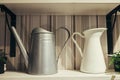 Home decoration,watering can display on rack