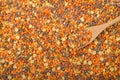 Background image lentils for bean soup with wooden spoon