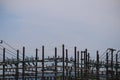 The background image of many electric poles and wires stacked in a high voltage plant.