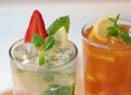 Background image with Mojito cocktail with strawberry, ice and mint Royalty Free Stock Photo