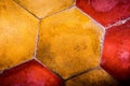 The background image of old colorful hexagonal clay tiles