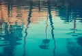 Background Image of Palm Trees Reflected in Swimming Pool Royalty Free Stock Photo