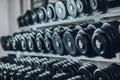 Background image of rows of dumbbells in the gym