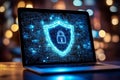 The background of the image shows a bright laptop screen with a shield and lock icon that represent cyber security. Royalty Free Stock Photo