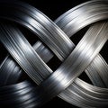 This is a background image in which silver intersecting streamlines are drawn with a brush on a black background Royalty Free Stock Photo