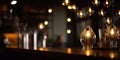 background Image of wooden table in front of abstract blurred restaurant lights