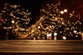 Background Image of wooden table in front of street abstract blurred lights view Royalty Free Stock Photo