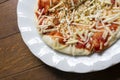 Background of Instant pizza cheese and ketchup over origano on w Royalty Free Stock Photo