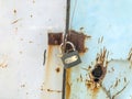 Background with an iron rusty door from the car with a lock.