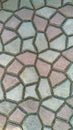 Background of irregular gray-pink cement tiles