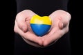 background isolated issue political Russia Ukraine crisis war idendity national Ukraine flag heart Holding