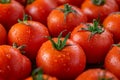 Background of juicy red wet fresh tomatoes, healthy food. The image is generated with the use of an AI. Royalty Free Stock Photo