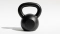 Background the kettlebell casts a soft shadow to the left emphasizing Royalty Free Stock Photo
