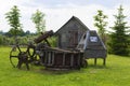 Background landscape old wooden wooden farm buildings in the park of the museum of ancient crafts Dudutki