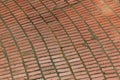 Background of large arch of rows of red brick flooring, dark mortar, copy space Royalty Free Stock Photo