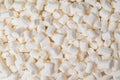 Background of a large number of white marshmallows. Flat lay