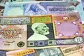 Background of Libyan money dinars banknotes with portraits of Omar Al-Mukhtar and Muammar Gaddafi on some banknotes