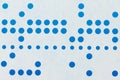 Background macro of perforated punched tape Royalty Free Stock Photo