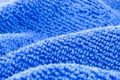 Background made of blue microfiber fabric, selective focus. Royalty Free Stock Photo