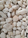 Background made of a closeup of a pile of pebbles Royalty Free Stock Photo