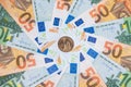 Background made of euro banknotes and dollar coin Royalty Free Stock Photo